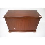 A contemporary mahogany trunk blanket box.