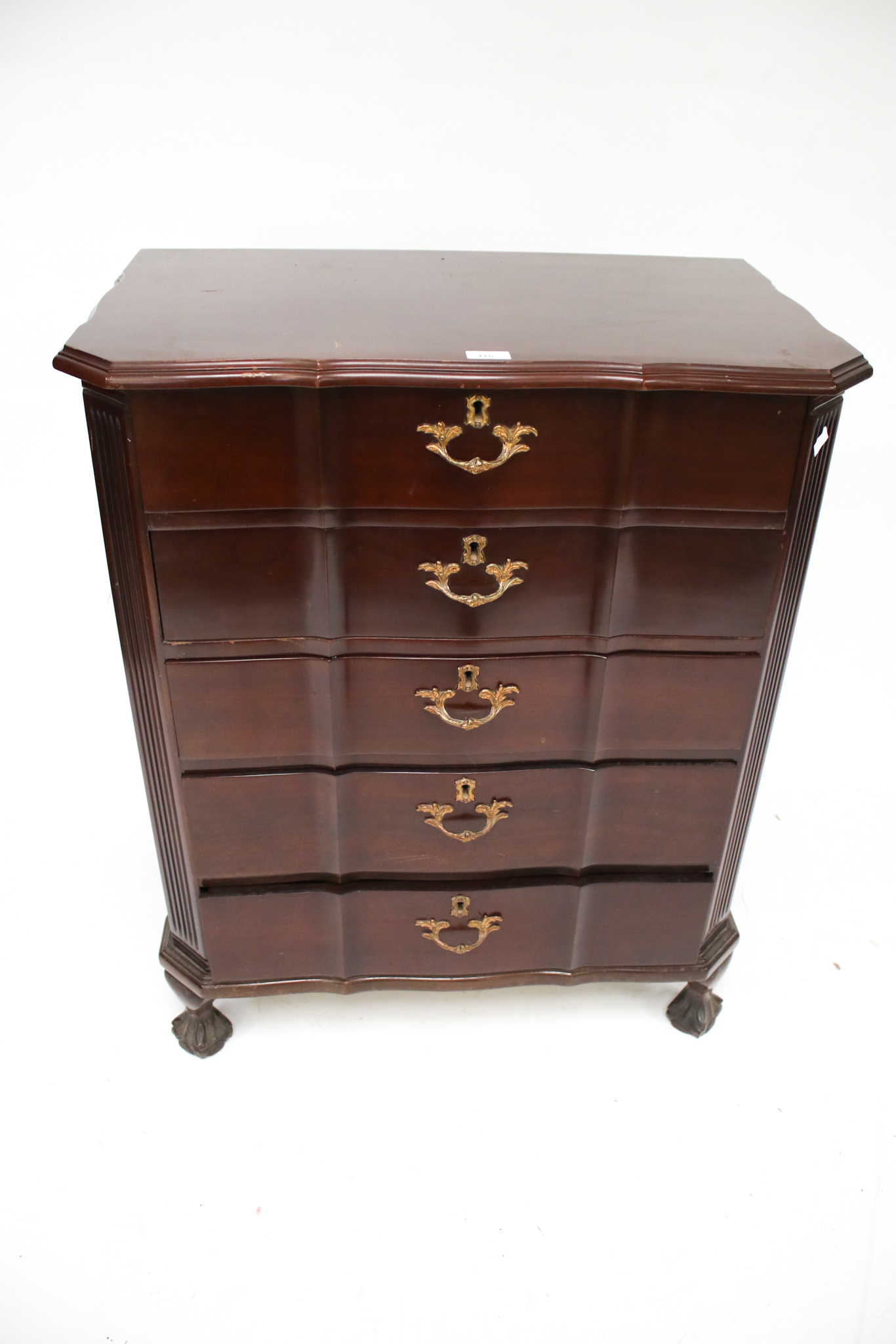 A 20th century chest of drawers.