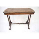 A late Victorian walnut side table.