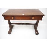 A Victorian mahogany writing table with single draw.