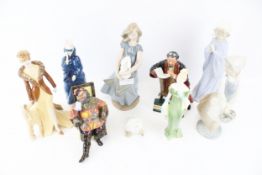 A collection of nine assorted 20th century porcelain figures.