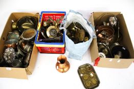 A large collection of assorted copper and brassware. Including bowls, ornaments, candlesticks, etc.