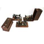 Three vintage hand crank sewing machines. Including a 'Robert Reid, Bristol' no.