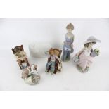 Five Lladro porcelain figures plus and a Collectors Society plaque.