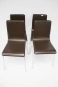 Set of four contemporary dining chairs with chrome legs.