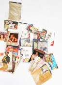An assortment of vintage erotic collectables. Including calendars, magazines, glazed prints, etc.