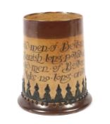 A late 19th century Doulton Lambeth salt glaze stoneware American market motto tankard. Impressed J.