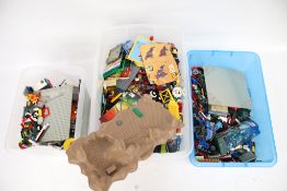 A large collection of Lego. Including building bricks, figures, vehicles, etc.