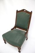 A mahogany framed upholstered chair.