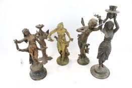 Collection of five spelter metal figures. Including an 'Eygptian' candlestick, etc. Max.