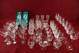 Multiple sets of 20th century and later glasses.