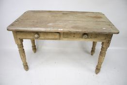 A vintage pine kitchen table.