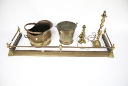 A collection of brassware.