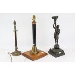 Three assorted table lamp bases. Including a pub beer pump pull, a weighted spelter figure, etc.