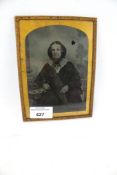 A Victorian Ambrotype studio photograph of a lady in a gilt metal frame. H17cm, AF.