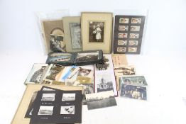 A collection of Victorian and later photographs, postcards and cigarette cards.