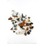 A collection of 20th century ceramic figures of animals.