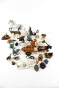 A collection of 20th century ceramic figures of animals.