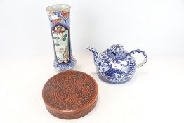 An assortment of Chinese and Japanese collectables.