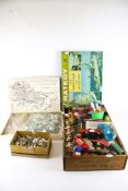 A collection of assorted vintage toys and games. Including jigsaws, Dinky die cast models, etc.