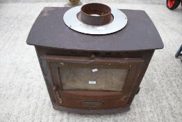 A vintage Aarrow multifuel stove.