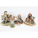 A collection of four assorted Capodimonte figures. Max.