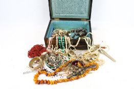 An assortment of jewellery. Including necklaces, bracelets, a bangle, etc.