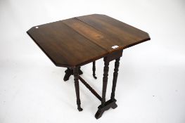 A Victorian Sutherland mahogany table.