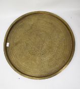 A large Middle Eastern brass charger.