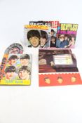 An assortment of Beatles collectables and ephemera.