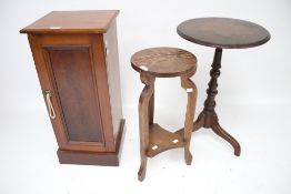 A group of three pieces of assorted furniture.
