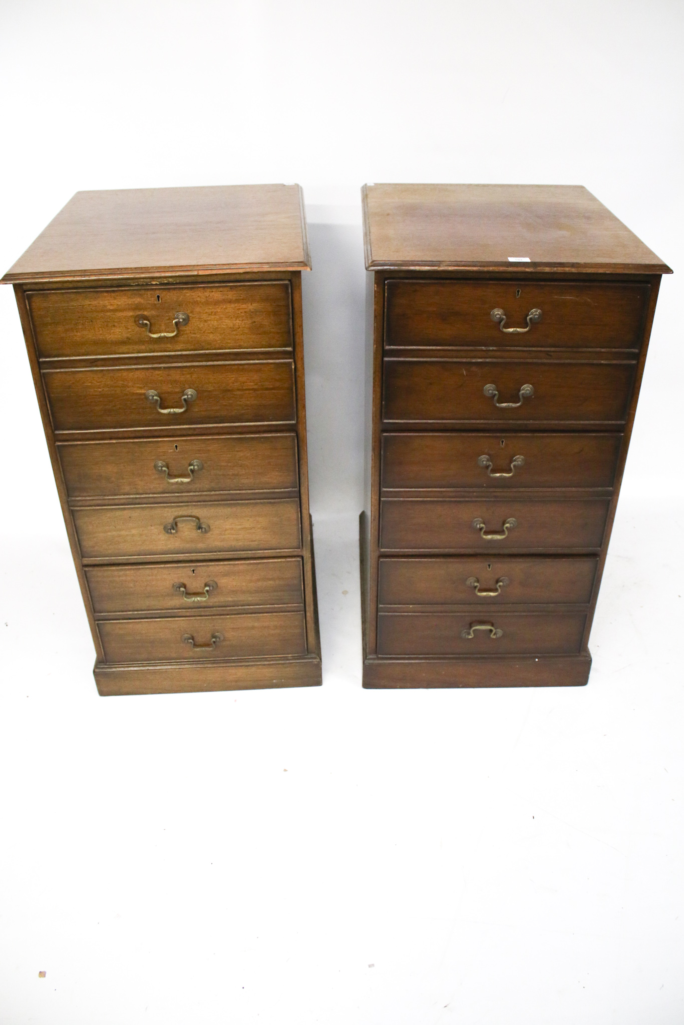 A pair of reproduction Georgian style wooden filing cabinets.