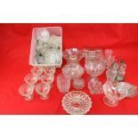 A collection of assorted vintage glassware.