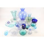 A collection of assorted vintage blue glassware. Including a large vase, dishes and urns, etc. Max.