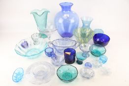 A collection of assorted vintage blue glassware. Including a large vase, dishes and urns, etc. Max.
