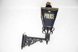 A vintage Police outdoor wall lantern.