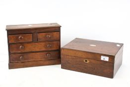 A miniature chest of drawers and a mahogany box.