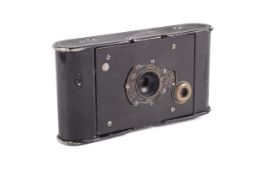 A vintage Kodak folding bellows camera.