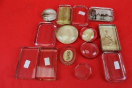 A collection of glass paperweights.