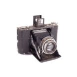 A Zeiss Ikon Ikonta 6x6 medium format folding camera with an anastigmat lens.