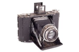 A Zeiss Ikon Ikonta 6x6 medium format folding camera with an anastigmat lens.