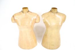 Two fibreglass female mannequin torsos.