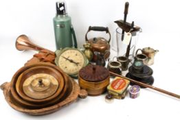 An assortment of metal and wooden collectables.
