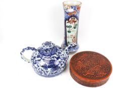 An assortment of Chinese and Japanese collectables.