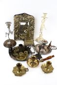 A collection of Victorian and later candlestick holders and framed mirror.