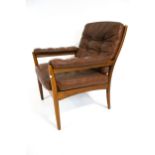 A Swedish Gote Mobel lounge open armchair. With chestnut leather button back cushions.