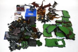 A collection of assorted Mega Bloks Dragons construction sets, etc.