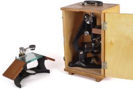 A Watson & Sons Ltd 'Kima' microscope and a dissecting microscope.