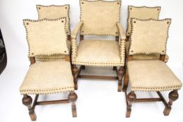 A set of five contemporary oak framed chairs. Comprising four dining chairs and a carver chair.