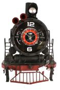 A novelty 'train' wall clock. In the form of the front of a USA railroad steam loco.